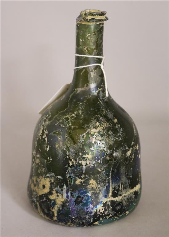 A mid 18th Century mallet shaped olive green bottle